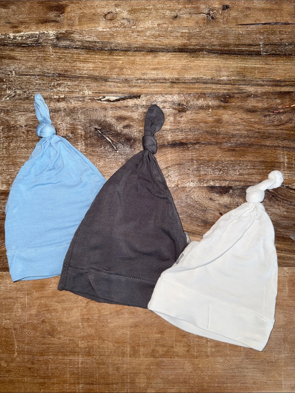 Kyte BABY Knotted Newborn Beanie Set in Light Blue, Charcoal, and Cream